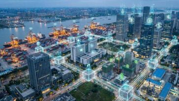 Futuristic city skyline overlay with digital blockchain connections illustrating blockchain applications 2025 in supply chain, finance, and healthcare industries.